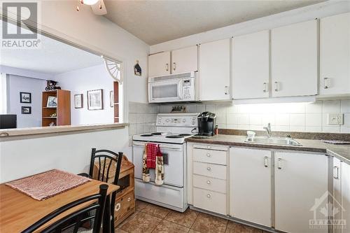 3100 Carling Avenue Unit#110, Ottawa, ON - Indoor Photo Showing Kitchen