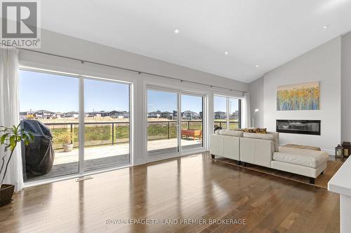 2020 Wateroak Drive, London, ON - Indoor Photo Showing Living Room With Fireplace