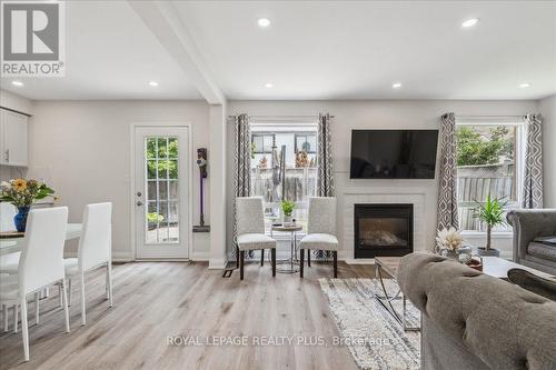 487 Cedar Hedge Road, Milton (Clarke), ON - Indoor Photo Showing Living Room With Fireplace