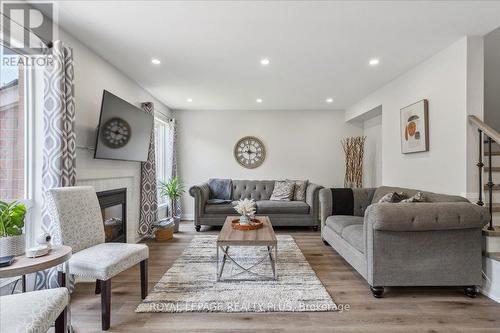 487 Cedar Hedge Road, Milton (Clarke), ON - Indoor Photo Showing Living Room With Fireplace