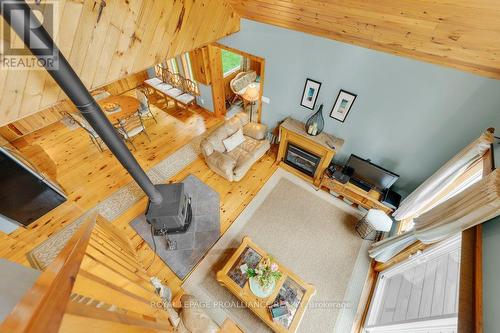 1018A Leisure Lane, North Frontenac, ON - Indoor Photo Showing Other Room With Fireplace