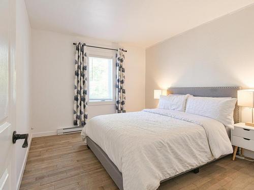 Master bedroom - 143 Rue St-Vincent, Sainte-Agathe-Des-Monts, QC - Indoor Photo Showing Bedroom