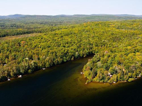 Bord de l'eau - 840 Ch. Du Lac-Bouthillier, Saint-Aimé-Du-Lac-Des-Îles, QC - Outdoor With Body Of Water With View