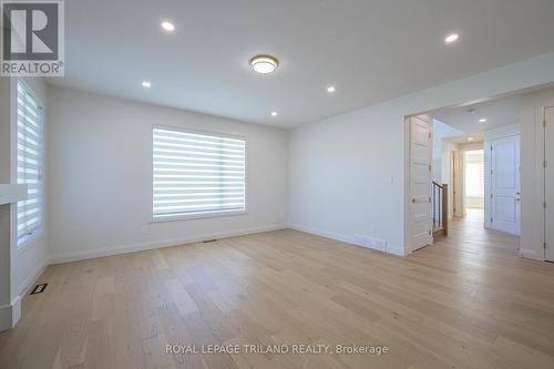 3741 Somerston Crescent, London, ON - Indoor Photo Showing Other Room With Fireplace