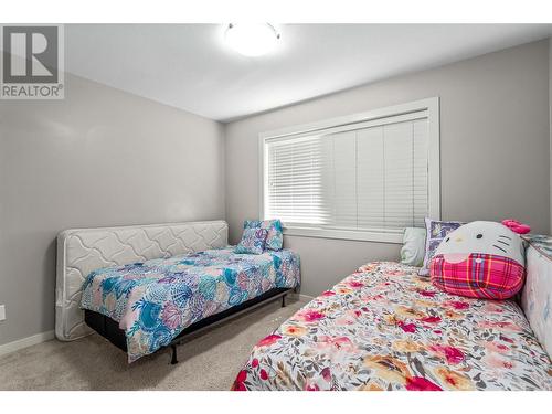 120 Hartman Road Unit# 110, Kelowna, BC - Indoor Photo Showing Bedroom