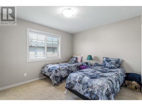 120 Hartman Road Unit# 110, Kelowna, BC - Indoor Photo Showing Bedroom