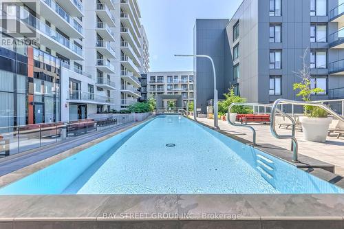 611 - 18 Rouge Valley Drive, Markham (Unionville), ON - Outdoor With In Ground Pool With Balcony