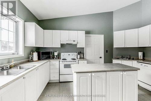 211 - 75 Treelawn Boulevard, Vaughan, ON - Indoor Photo Showing Kitchen With Double Sink