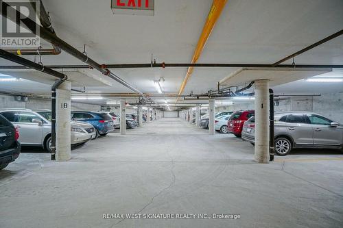 211 - 75 Treelawn Boulevard, Vaughan, ON - Indoor Photo Showing Garage