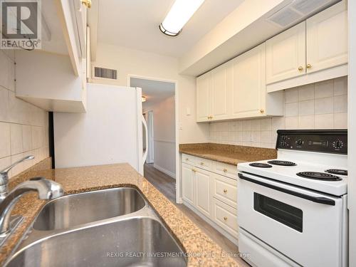 419 - 1333 Bloor Street E, Mississauga (Applewood), ON - Indoor Photo Showing Kitchen With Double Sink