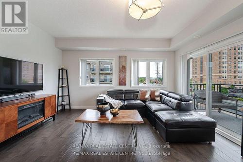 305 - 5150 Winston Churchill Boulevard, Mississauga (Churchill Meadows), ON - Indoor Photo Showing Living Room With Fireplace