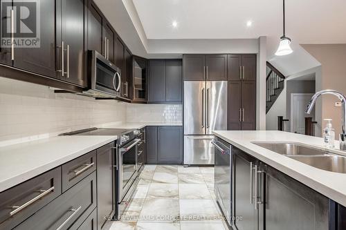 44 - 1890 Rymal Road E, Hamilton (Stoney Creek), ON - Indoor Photo Showing Kitchen With Stainless Steel Kitchen With Double Sink With Upgraded Kitchen