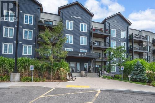 112 - 54 Koda Street, Barrie, ON - Outdoor With Balcony With Facade