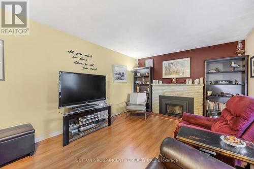 23 Shirley Avenue, Barrie, ON - Indoor Photo Showing Living Room With Fireplace