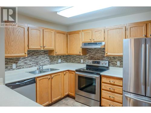 187 Warren Avenue W Unit# 206, Penticton, BC - Indoor Photo Showing Kitchen With Stainless Steel Kitchen With Double Sink