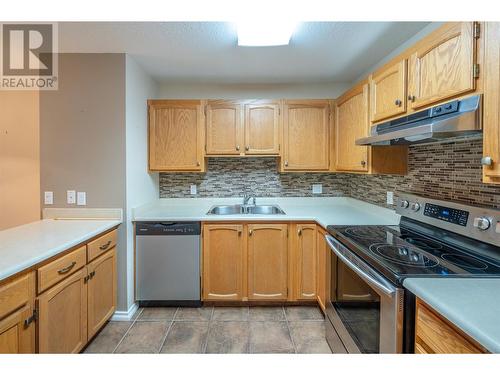 187 Warren Avenue W Unit# 206, Penticton, BC - Indoor Photo Showing Kitchen With Stainless Steel Kitchen With Double Sink