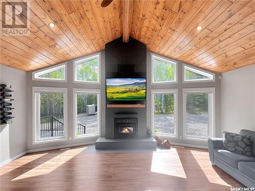 306 Meadow Ridge Drive, Candle Lake, SK - Indoor Photo Showing Living Room With Fireplace