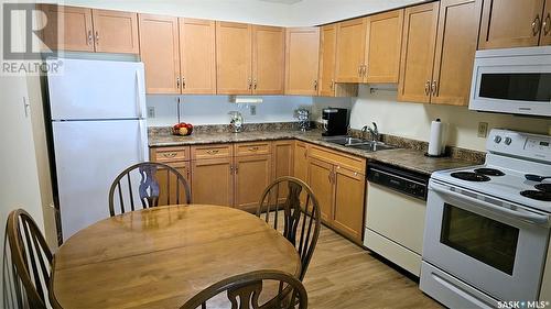 103 706 Confederation Drive, Saskatoon, SK - Indoor Photo Showing Kitchen With Double Sink