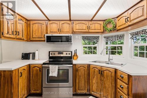 19 Highbush Road, Hastings Highlands, ON - Indoor Photo Showing Kitchen With Double Sink