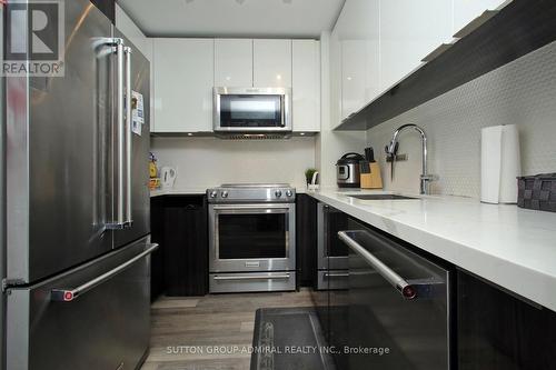 923 - 30 Shore Breeze Drive, Toronto (Mimico), ON - Indoor Photo Showing Kitchen With Stainless Steel Kitchen