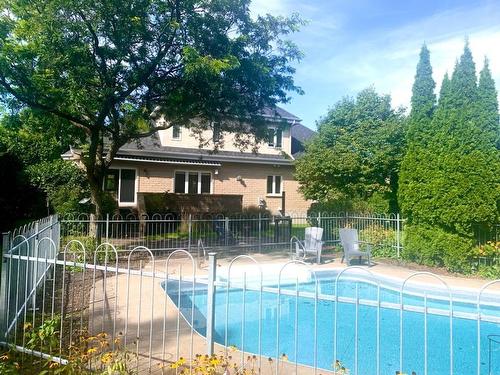 Vue d'ensemble - 106 Rue Olivier-Morel, Carignan, QC - Outdoor With In Ground Pool With Backyard