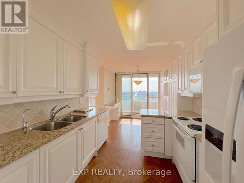 1704 - 10 Torresdale Avenue, Toronto (Westminster-Branson), ON - Indoor Photo Showing Kitchen With Double Sink