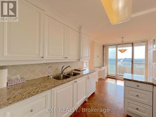 1704 - 10 Torresdale Avenue, Toronto, ON - Indoor Photo Showing Kitchen With Double Sink