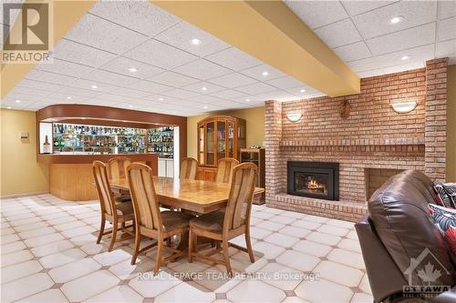 16 Jeremiah Place, Ottawa, ON - Indoor Photo Showing Dining Room With Fireplace