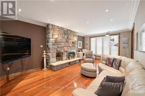 16 Jeremiah Place, Ottawa, ON - Indoor Photo Showing Living Room With Fireplace