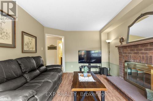 19 Peck Street, Barrie (Painswick North), ON - Indoor Photo Showing Living Room With Fireplace