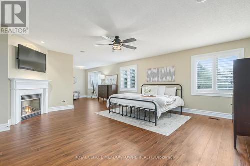 39 Leader Court, Erin, ON - Indoor Photo Showing Bedroom With Fireplace