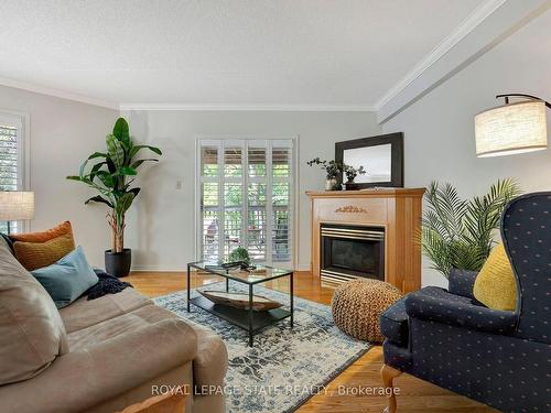 23-2120 Headon Rd, Burlington, ON - Indoor Photo Showing Living Room With Fireplace