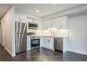 2B-38 Howe Dr, Kitchener, ON  - Indoor Photo Showing Kitchen With Stainless Steel Kitchen With Upgraded Kitchen 