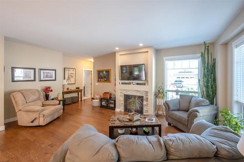 150-1675 Penticton Avenue, Penticton, BC - Indoor Photo Showing Living Room With Fireplace