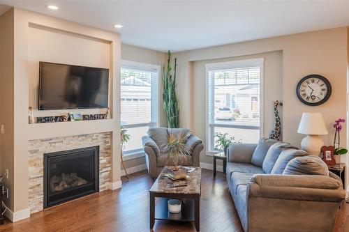 150-1675 Penticton Avenue, Penticton, BC - Indoor Photo Showing Living Room With Fireplace