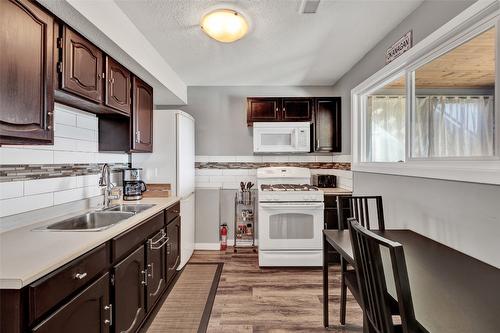 1715 Sonora Drive, Kelowna, BC - Indoor Photo Showing Kitchen With Double Sink