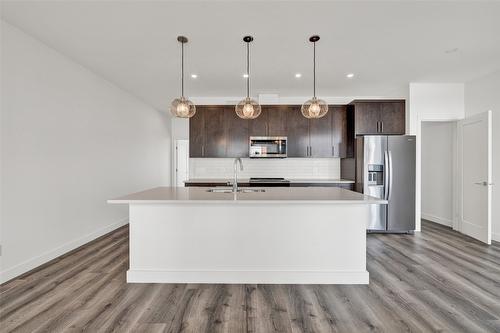 338-610 Academy Way, Kelowna, BC - Indoor Photo Showing Kitchen With Stainless Steel Kitchen With Upgraded Kitchen