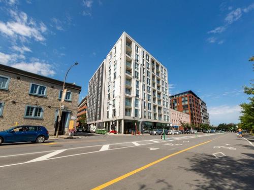 View - 301-711 Rue De La Commune O., Montréal (Ville-Marie), QC - Outdoor With Balcony With Facade