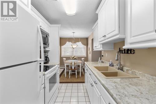 570 Macdonald Ave # 103, Sault Ste. Marie, ON - Indoor Photo Showing Kitchen With Double Sink