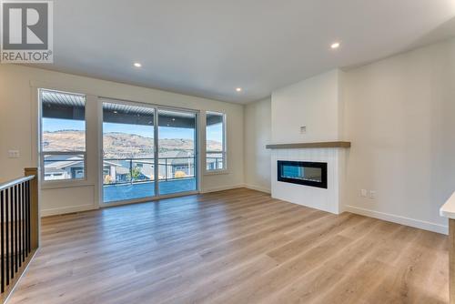 7760 Okanagan Landing Road Unit# 130, Vernon, BC - Indoor Photo Showing Living Room With Fireplace