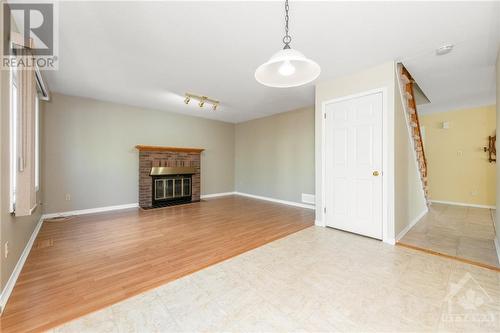 3754 Autumnwood Street, Ottawa, ON - Indoor Photo Showing Living Room With Fireplace