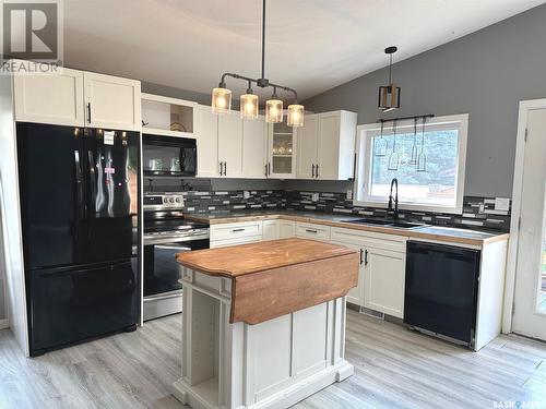 712 Boyle Street, Indian Head, SK - Indoor Photo Showing Kitchen With Double Sink