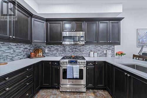 1664 Moyer Avenue, Innisfil (Alcona), ON - Indoor Photo Showing Kitchen With Upgraded Kitchen