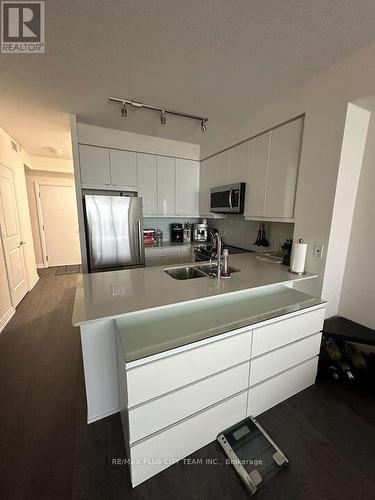 408 - 50 Thomas Riley Road, Toronto, ON - Indoor Photo Showing Kitchen With Double Sink