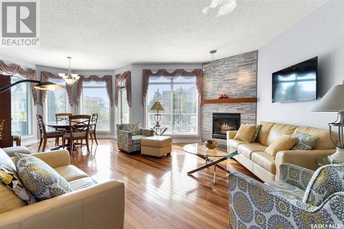 923 Brookhurst Lane, Saskatoon, SK - Indoor Photo Showing Living Room With Fireplace