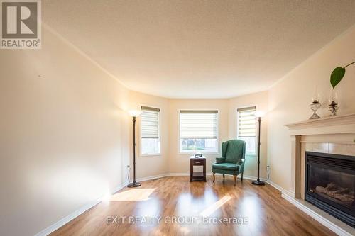 66 Heritage Drive, Prince Edward County (Wellington), ON - Indoor Photo Showing Living Room With Fireplace