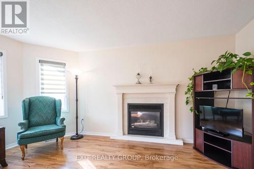 66 Heritage Drive, Prince Edward County (Wellington), ON - Indoor Photo Showing Living Room With Fireplace