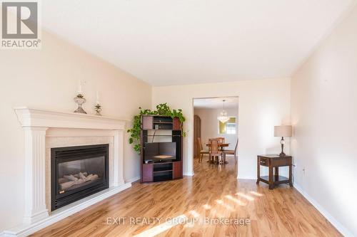 66 Heritage Drive, Prince Edward County (Wellington), ON - Indoor Photo Showing Living Room With Fireplace