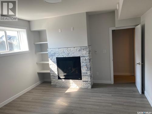 274 Stromberg Court, Saskatoon, SK - Indoor Photo Showing Living Room With Fireplace