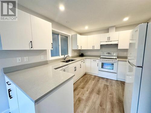 6201 Maple Drive Unit# 102, Osoyoos, BC - Indoor Photo Showing Kitchen With Double Sink